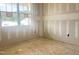 Unfinished room with a large window providing ample light, ready for customization at 266 Golfview Ave, Benson, NC 27504
