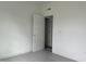 Bedroom featuring an open doorway to another room, creating a spacious feel at 283 Golfview Avenue, Benson, NC 27504