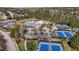 This community features a pool, clubhouse, splash pad, tennis courts, and parking in a beautiful wooded setting at 3509 Archdale Dr, Raleigh, NC 27614