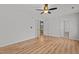 Bedroom with hardwood floors, ceiling fan and closet at 3509 Archdale Dr, Raleigh, NC 27614