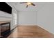 Spacious living room featuring hardwood floors and a beautiful fireplace at 3509 Archdale Dr, Raleigh, NC 27614