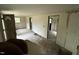 Spacious living room features a large front door, multiple windows, and access to other rooms at 3541 Holden Acres Dr, Wendell, NC 27591