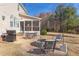 Lovely backyard with a patio, fire pit, and lush green lawn at 3708 Tansley St, Wake Forest, NC 27587