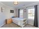 Inviting bedroom with two windows, a plush bed and carpet, creating a cozy and restful atmosphere at 3708 Tansley St, Wake Forest, NC 27587