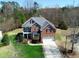 Charming two-story home with a well-manicured lawn, brick facade and attached two car garage at 3708 Tansley St, Wake Forest, NC 27587