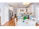 Open kitchen features stainless steel appliances and breakfast nook, with views of the exterior at 3708 Tansley St, Wake Forest, NC 27587