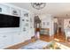 Cozy living room with hardwood floors open to kitchen, perfect for entertaining at 3708 Tansley St, Wake Forest, NC 27587