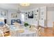 Cozy living space with a dining table, decor shelving and comfortable seating at 3708 Tansley St, Wake Forest, NC 27587
