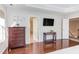 Spacious main bedroom with hardwood flooring and open access to the Primary bathroom at 3708 Tansley St, Wake Forest, NC 27587