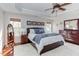 Serene main bedroom with a tray ceiling and a dresser mirror at 3708 Tansley St, Wake Forest, NC 27587
