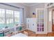 Inviting playroom with hardwood floors, natural light, toy organizers, and a charming play table at 3708 Tansley St, Wake Forest, NC 27587