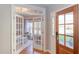 Bright and open playroom with hardwood floors, french doors and an abundance of toys at 3708 Tansley St, Wake Forest, NC 27587