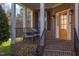 Inviting front porch with comfortable seating, perfect for relaxing and enjoying the outdoors at 3708 Tansley St, Wake Forest, NC 27587