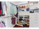 Customizable walk-in closet with shelving and storage solutions to maximize organization and accessibility at 3708 Tansley St, Wake Forest, NC 27587