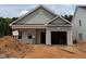 New construction home featuring light gray siding and an attached garage at 378 Bluejay St, Clayton, NC 27520