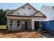 New construction home with unfinished yard and modern design elements ready for personalization at 378 Bluejay St, Clayton, NC 27520