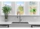A well-lit kitchen with a clean, white subway tile backsplash at 3847 Stoneridge Forest Dr, Raleigh, NC 27612