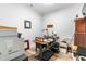 Small office space with wood floors and vintage decor at 3847 Stoneridge Forest Dr, Raleigh, NC 27612
