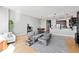 Spacious living room with hardwood floors, modern furniture, and an open layout at 400 W North St # 1204, Raleigh, NC 27603