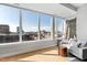 Living room with large windows offering great city views at 400 W North St # 1204, Raleigh, NC 27603