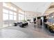 Spacious lounge with kitchen, stainless steel appliances, and seating areas at 400 W North St # 1204, Raleigh, NC 27603
