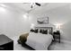 Relaxing main bedroom with soft carpeting, an elegant ceiling fan, and natural light from the windows at 400 W North St # 1204, Raleigh, NC 27603