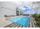 Inviting rooftop pool with lounge chairs and clear blue water, perfect for relaxation with views at 400 W North St # 1204, Raleigh, NC 27603