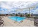 Rooftop pool with lounge chairs and stunning city views on a sunny day at 400 W North St # 1204, Raleigh, NC 27603