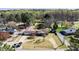 A sprawling estate features mature trees, a main house, outbuildings, and fenced pasture areas at 408 Rand Rd, Raleigh, NC 27603