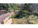 Aerial view of property with a detached garage and a shed at 408 Rand Rd, Raleigh, NC 27603