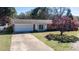 Charming single-story house with a spacious driveway and a two-car garage at 408 Rand Rd, Raleigh, NC 27603