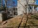 View of the backyard, showing a storage shed and space for various outdoor activities and landscaping opportunities at 424 Hocutt Farm Dr, Clayton, NC 27527