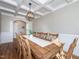 Elegant dining room features a wooden table, chandelier, and coffered ceilings at 424 Hocutt Farm Dr, Clayton, NC 27527