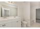 Stylish bathroom featuring double vanity sinks, modern fixtures, and a bathtub at 4320 Stony Falls Way, Knightdale, NC 27545