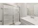 Clean bathroom featuring a shower with glass doors and a spacious vanity at 4320 Stony Falls Way, Knightdale, NC 27545