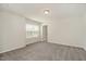 Large bedroom with neutral carpet, freshly painted walls and great natural light at 4320 Stony Falls Way, Knightdale, NC 27545