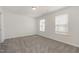 Bright bedroom featuring neutral carpet, freshly painted walls, and great natural light at 4320 Stony Falls Way, Knightdale, NC 27545