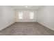 Spacious bedroom featuring neutral carpet, freshly painted walls and natural light at 4320 Stony Falls Way, Knightdale, NC 27545