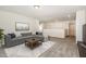 Inviting living area with comfortable seating, stylish decor, and neutral carpet at 4320 Stony Falls Way, Knightdale, NC 27545