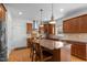 Well-appointed kitchen featuring granite countertops, stainless steel appliances, and wood cabinetry at 445 S Greensboro St, Carrboro, NC 27510