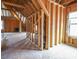 Unfinished attic with exposed rafters and trusses, showing the potential for new construction at 45 Carriden Dr, Youngsville, NC 27596