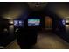 Home theater featuring recliner seating, large screen, and ambient lighting at 45 Carriden Dr, Youngsville, NC 27596