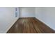 An Empty bedroom with hardwood floors and a window at 4601 Pemberton Dr, Raleigh, NC 27609