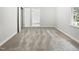 Neutral bedroom with new carpet, light walls, closet access, and ample natural light at 4601 Pemberton Dr, Raleigh, NC 27609