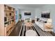Bright living room with hardwood floors, stylish furniture and decor at 4601 Pemberton Dr, Raleigh, NC 27609