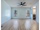 Bedroom features a ceiling fan, hardwood floors, and natural light at 471 Deer Run, Pittsboro, NC 27312