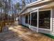 Wooden deck with railings and large windows at 471 Deer Run, Pittsboro, NC 27312
