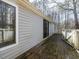 View of the deck with siding on the home at 471 Deer Run, Pittsboro, NC 27312