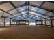 Interior view of garage with metal frame construction and open doorway to the exterior at 471 Deer Run, Pittsboro, NC 27312