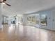 Bright living room with hardwood floors and windows providing ample natural light at 471 Deer Run, Pittsboro, NC 27312